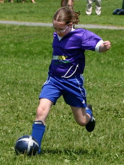 Emily playing soccer